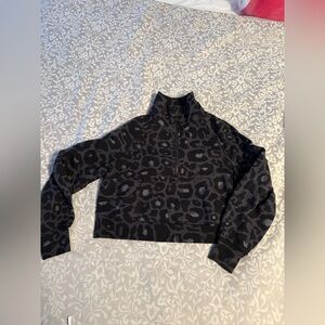 Lululemon size xs/s scuba funnel neck black Leopard Print Pullover